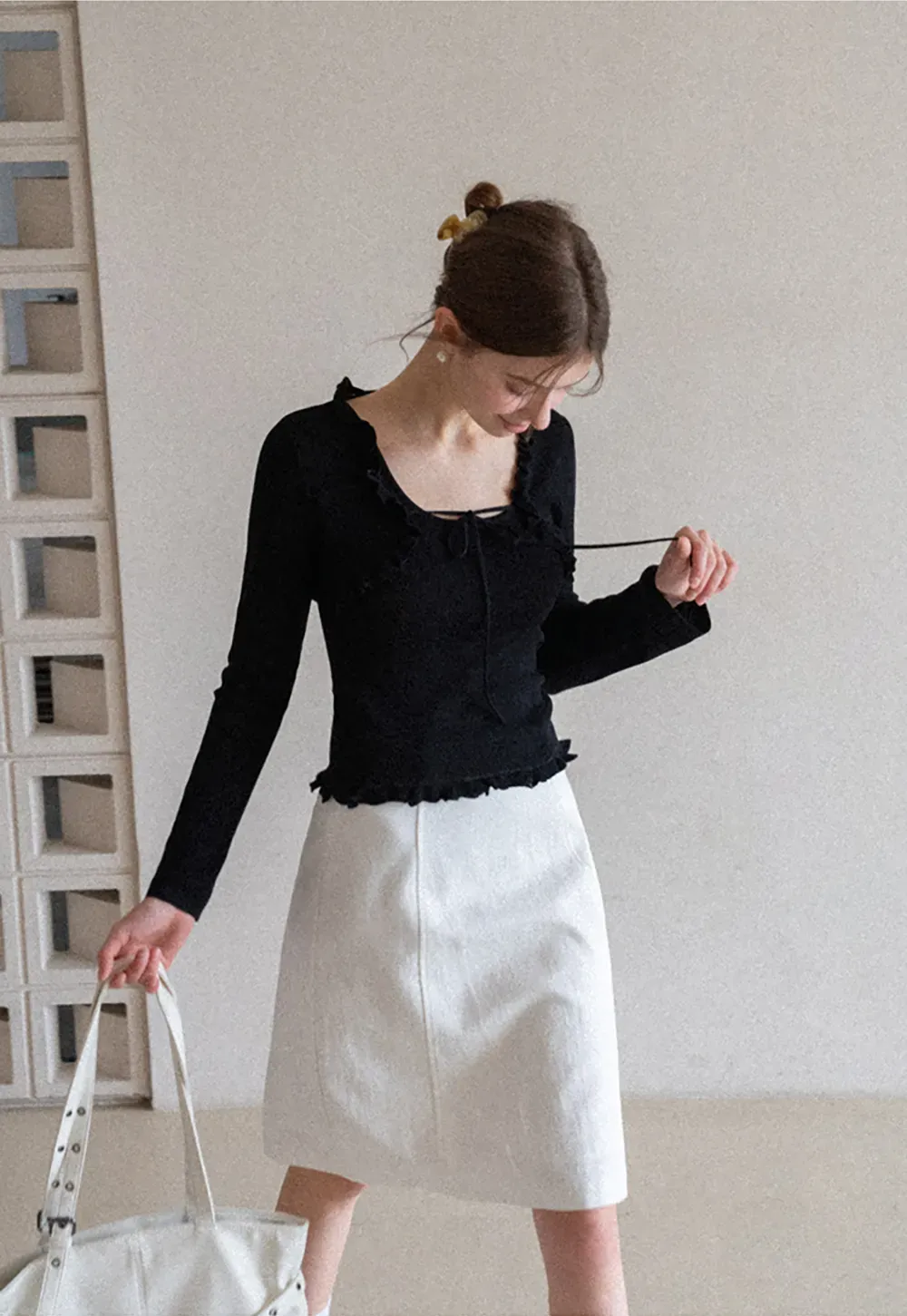 Woolen knit sweater with ruffles and tank top