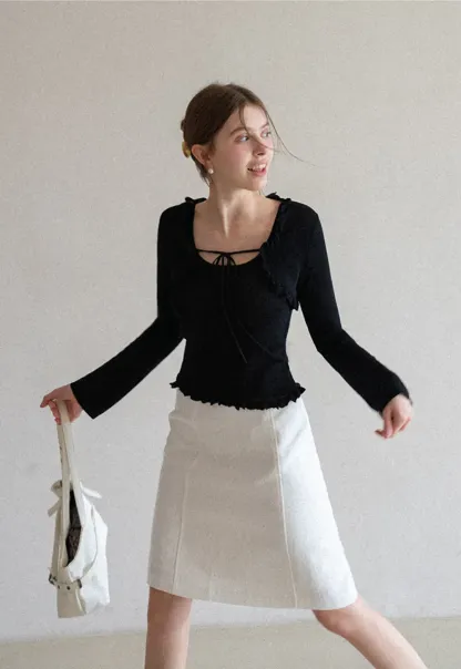 Woolen knit sweater with ruffles and tank top