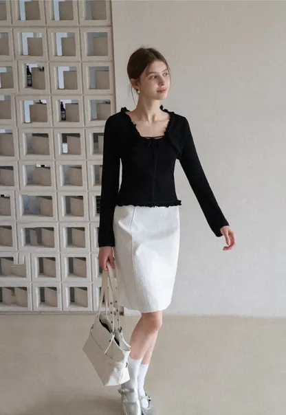 Woolen knit sweater with ruffles and tank top