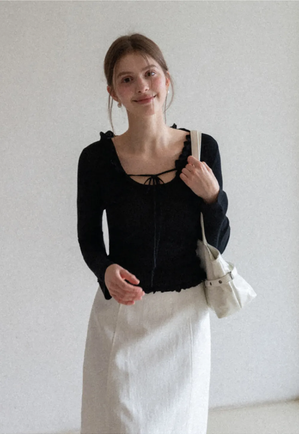 Woolen knit sweater with ruffles and tank top
