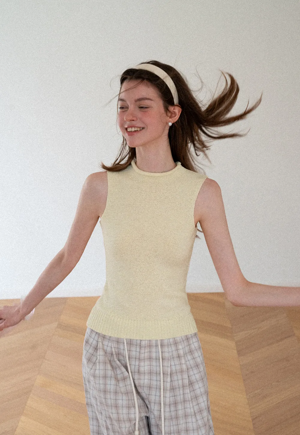 Ribbed Knit Sleeveless High Neck Sweater
