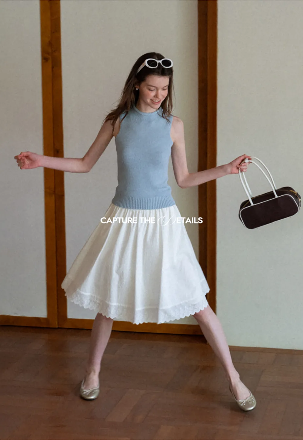 Ribbed Knit Sleeveless High Neck Sweater