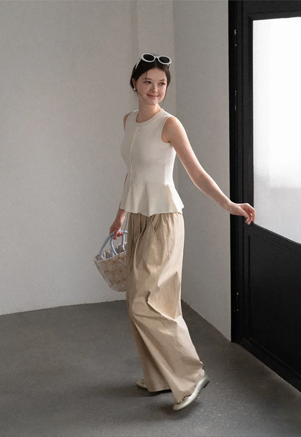 Peplum Hem Button Front Knit Sleeveless Top