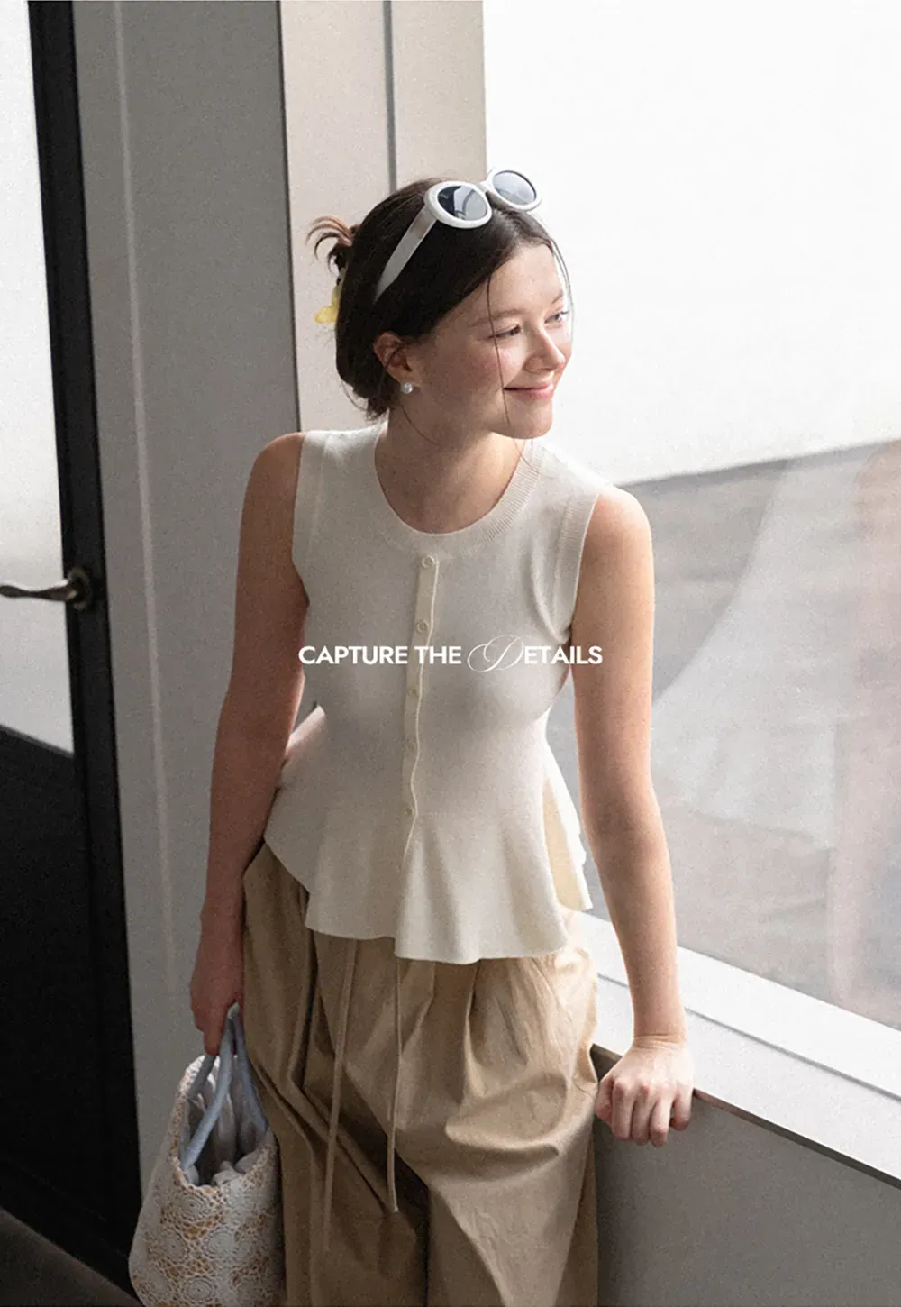 Peplum Hem Button Front Knit Sleeveless Top