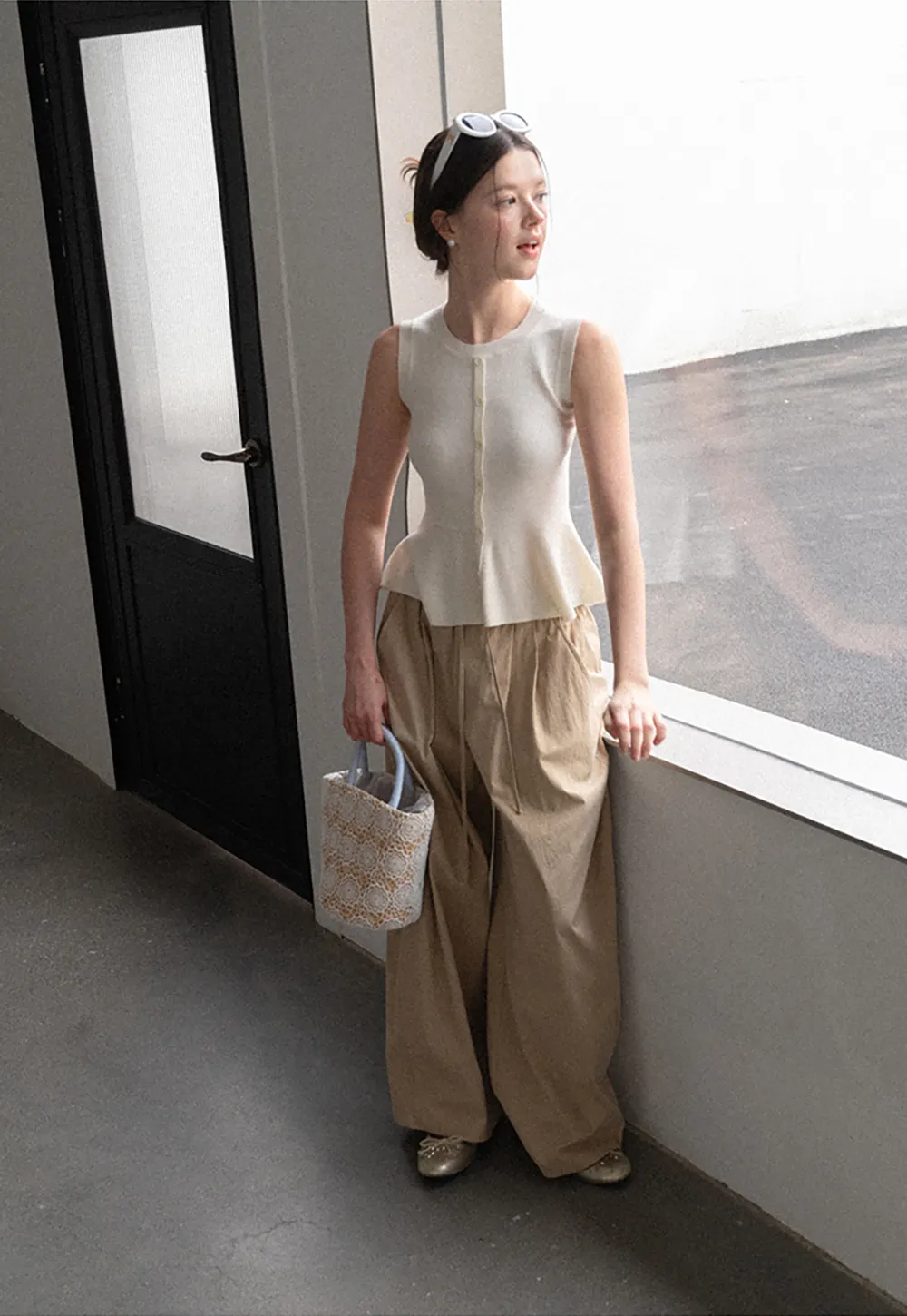 Peplum Hem Button Front Knit Sleeveless Top