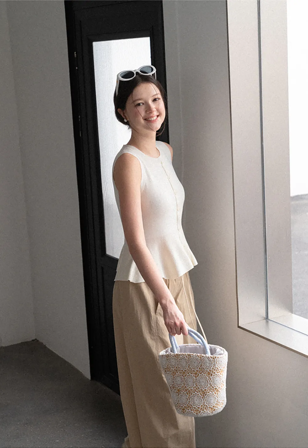 Peplum Hem Button Front Knit Sleeveless Top