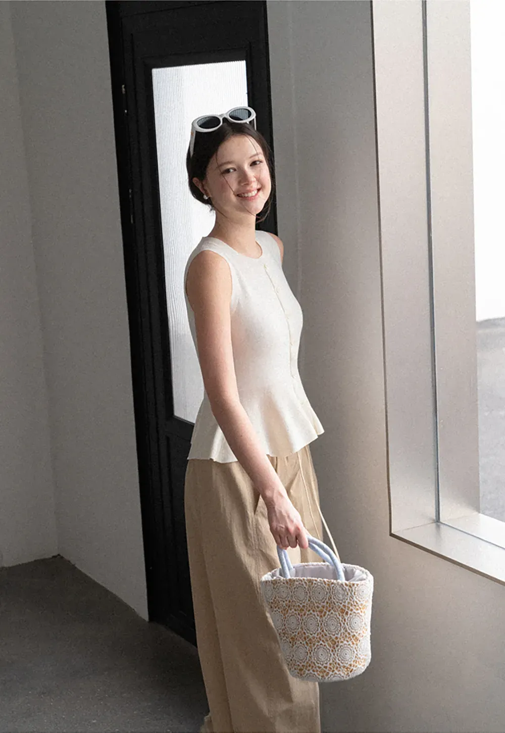 Peplum Hem Button Front Knit Sleeveless Top