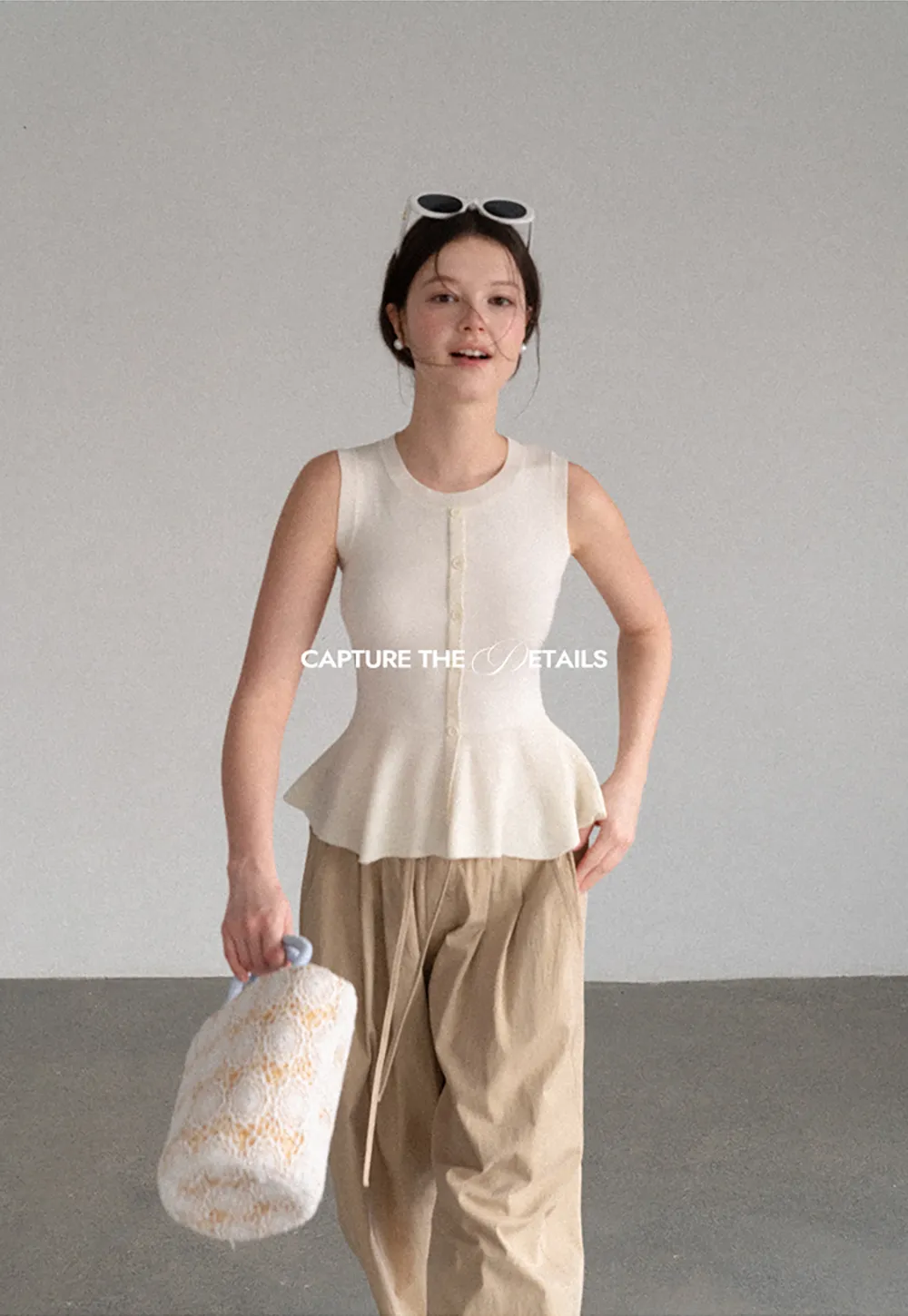 Peplum Hem Button Front Knit Sleeveless Top