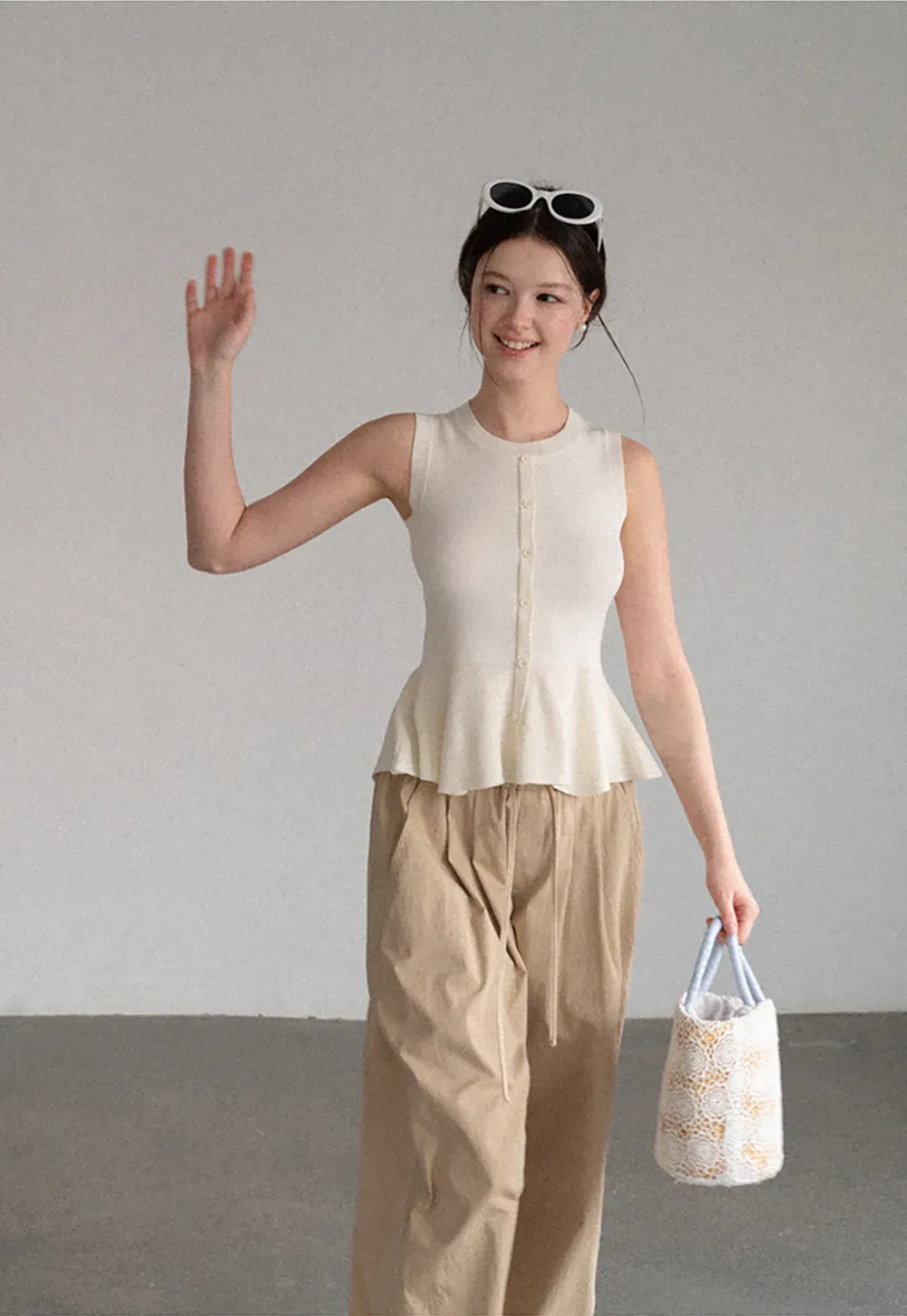 Peplum Hem Button Front Knit Sleeveless Top