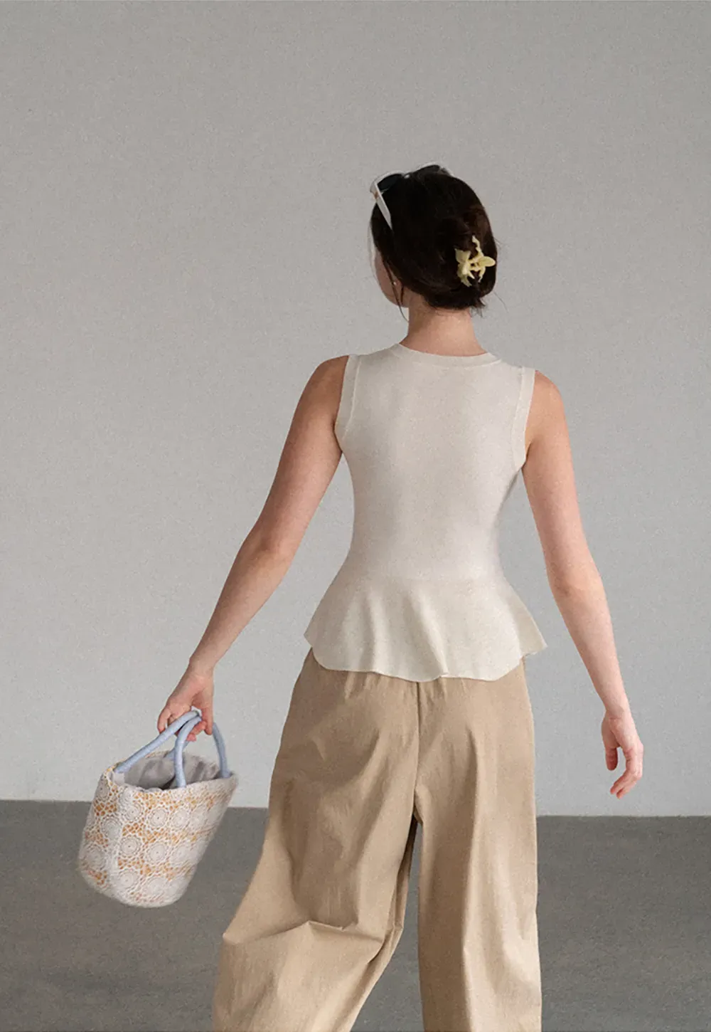 Peplum Hem Button Front Knit Sleeveless Top