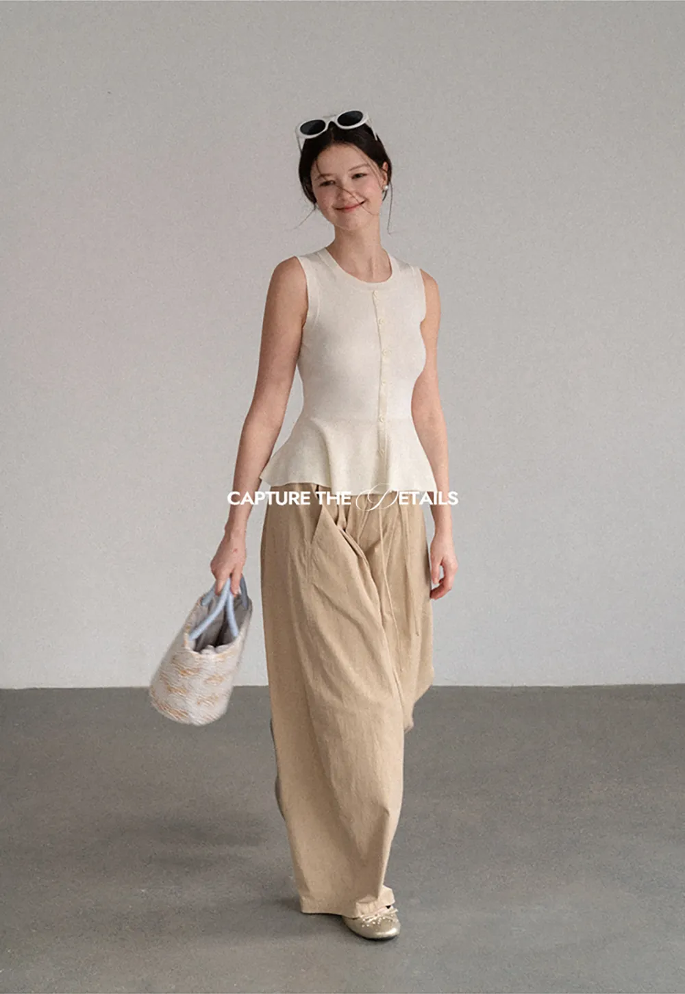 Peplum Hem Button Front Knit Sleeveless Top