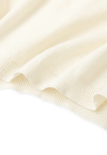 Pull sans manches en maille avec nœud papillon dans le dos