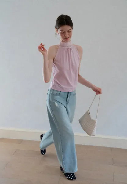 Pull sans manches en maille avec nœud papillon dans le dos