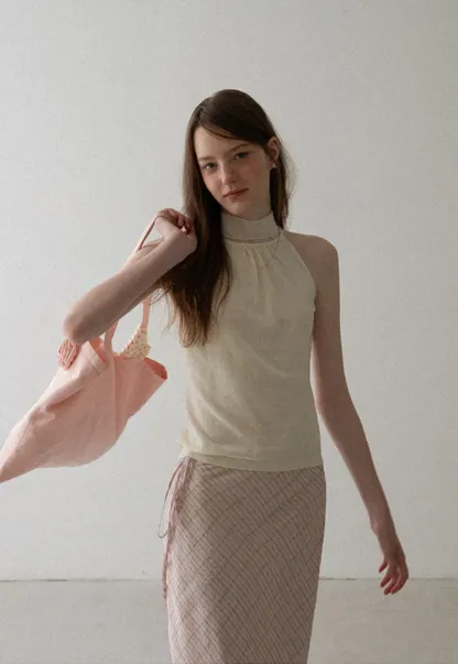 Pull sans manches en maille avec nœud papillon dans le dos