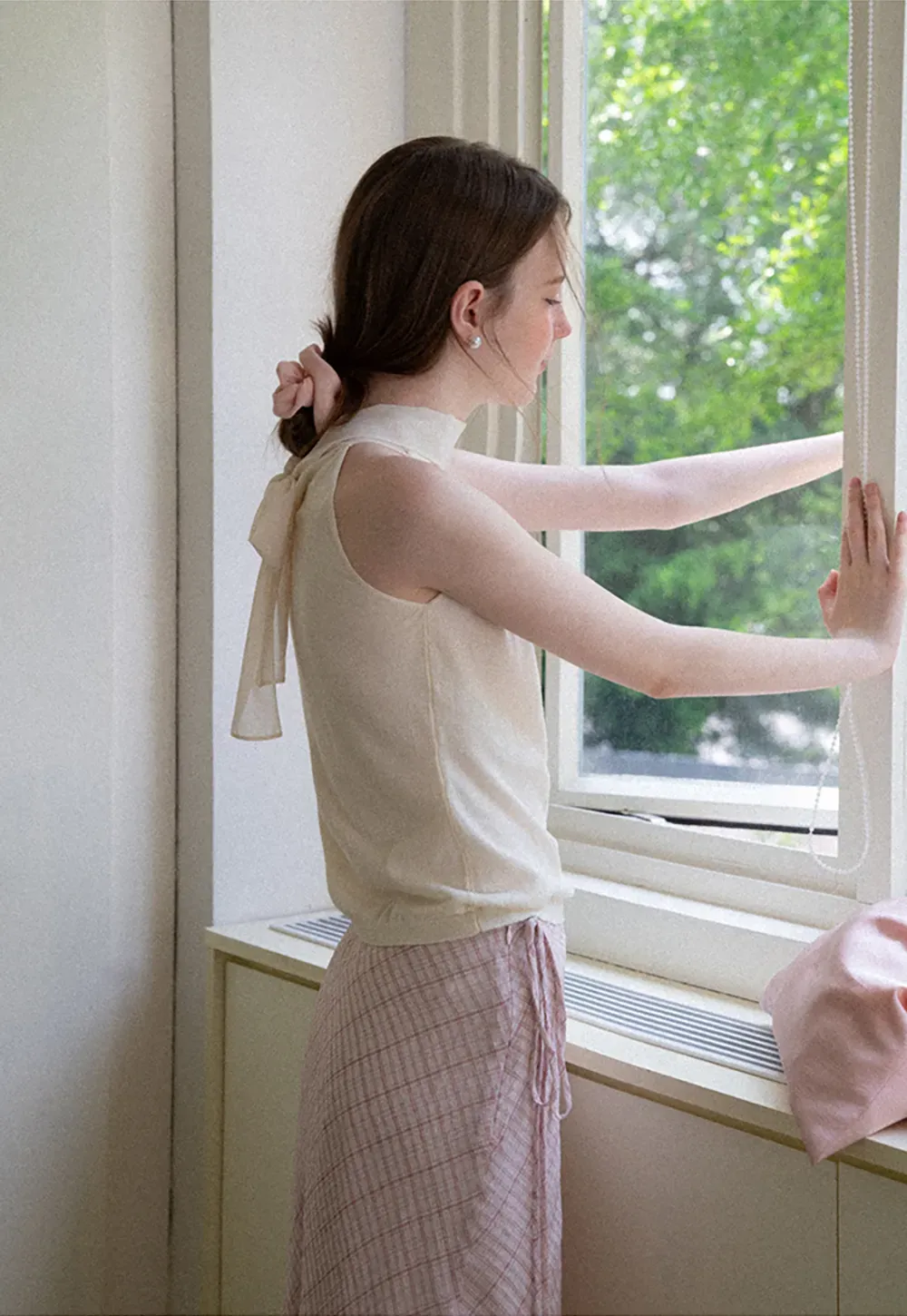 Pull sans manches en maille avec nœud papillon dans le dos