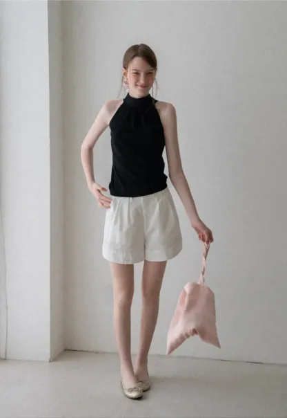 Pull sans manches en maille avec nœud papillon dans le dos
