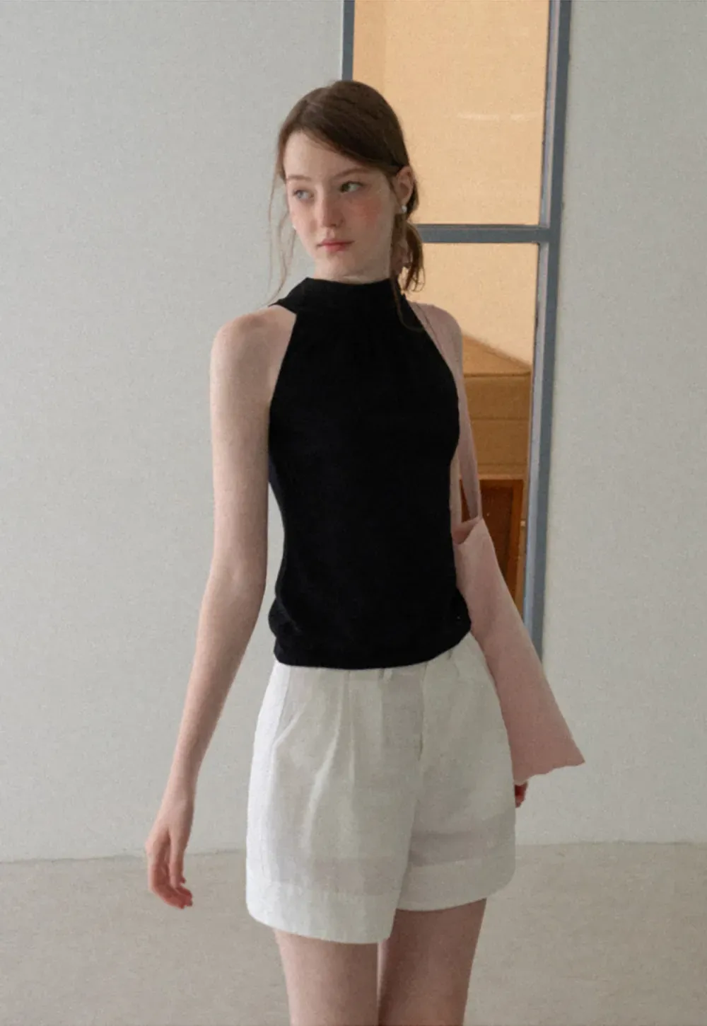 Pull sans manches en maille avec nœud papillon dans le dos