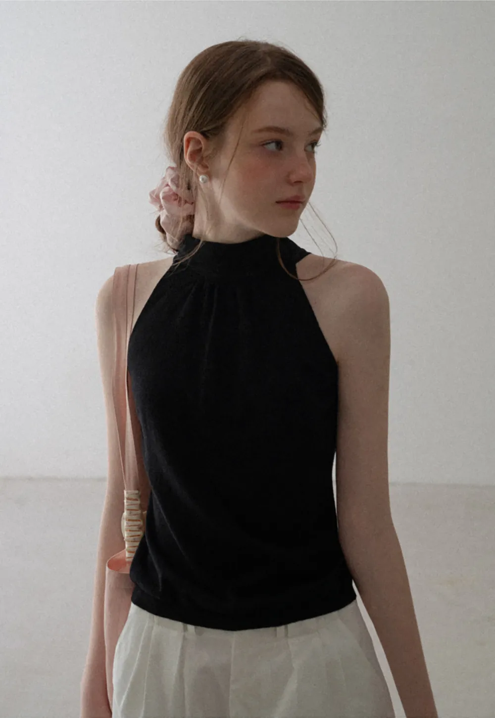Pull sans manches en maille avec nœud papillon dans le dos