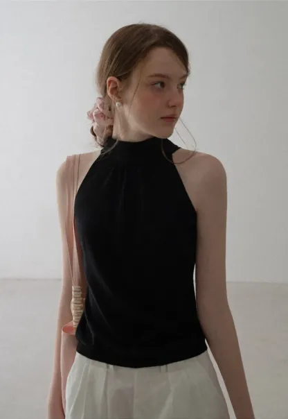 Pull sans manches en maille avec nœud papillon dans le dos