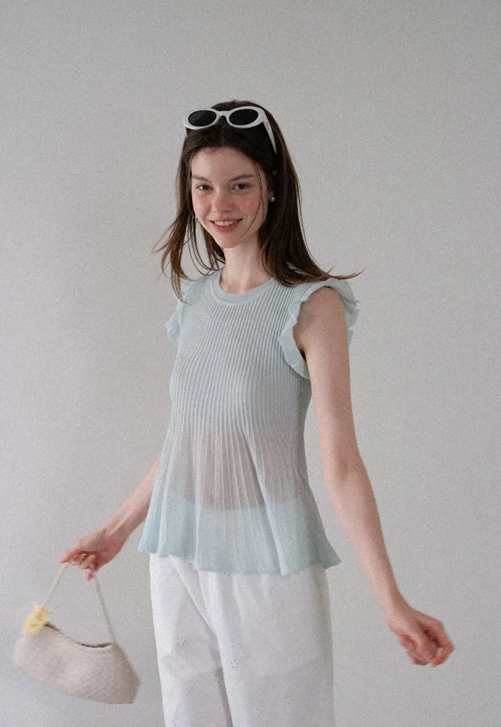 Ribbed Knit Sleeveless Top with Ruffle Detail