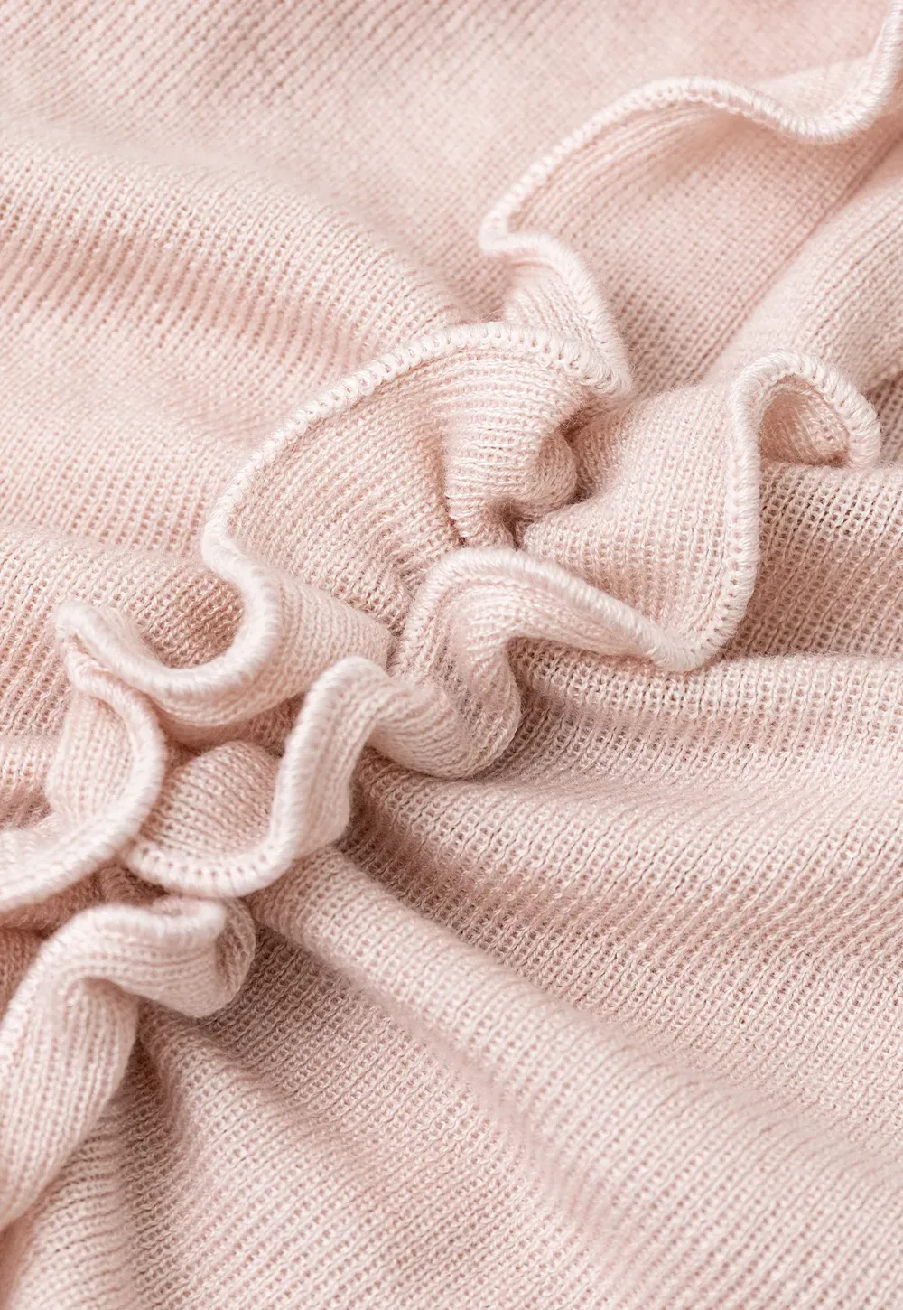 Ruffled V Neck Knit Sweater with Front Twist Detail