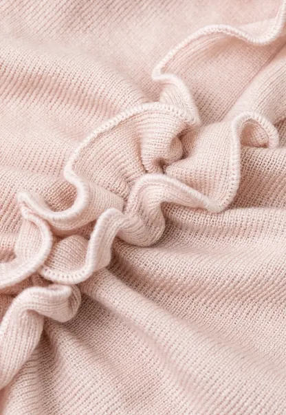 Ruffled V Neck Knit Sweater with Front Twist Detail