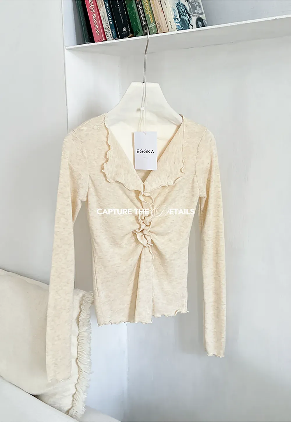 Ruffled V Neck Knit Sweater with Front Twist Detail