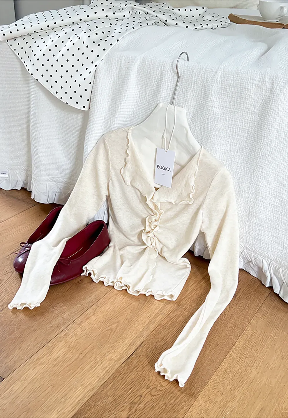 Ruffled V Neck Knit Sweater with Front Twist Detail