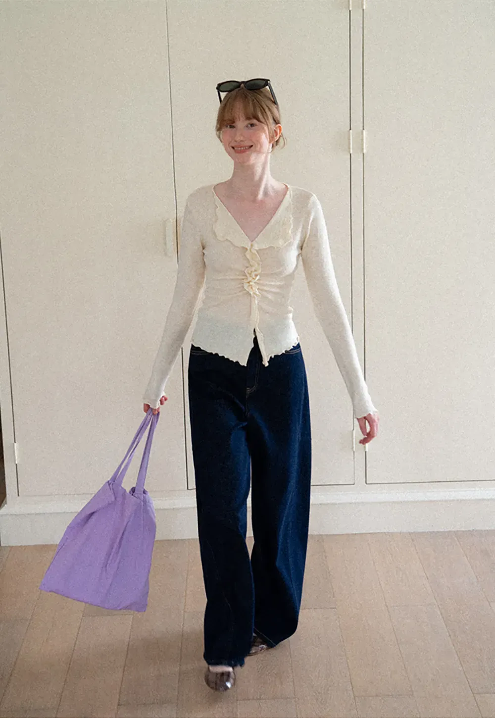Ruffled V Neck Knit Sweater with Front Twist Detail