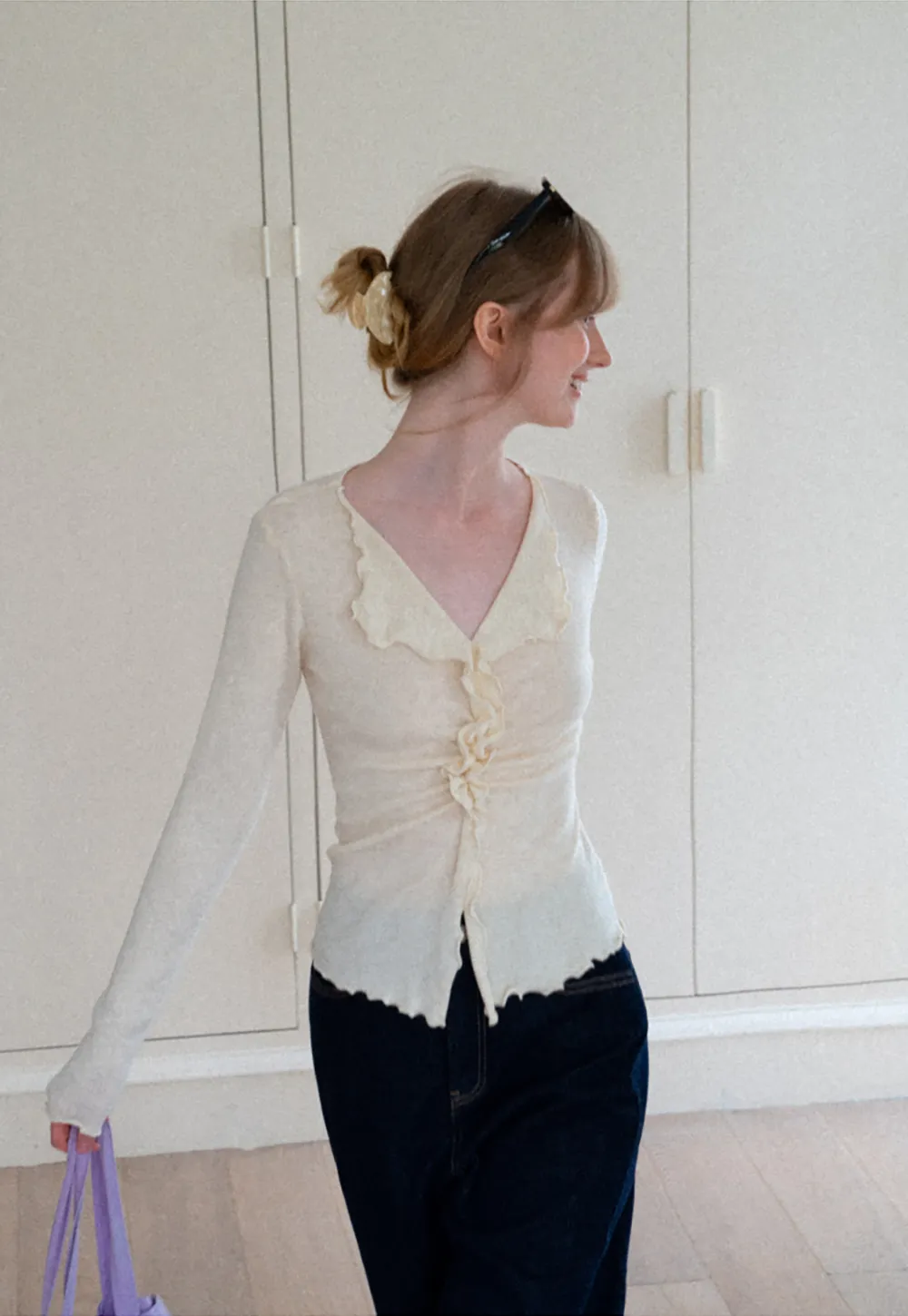 Ruffled V Neck Knit Sweater with Front Twist Detail