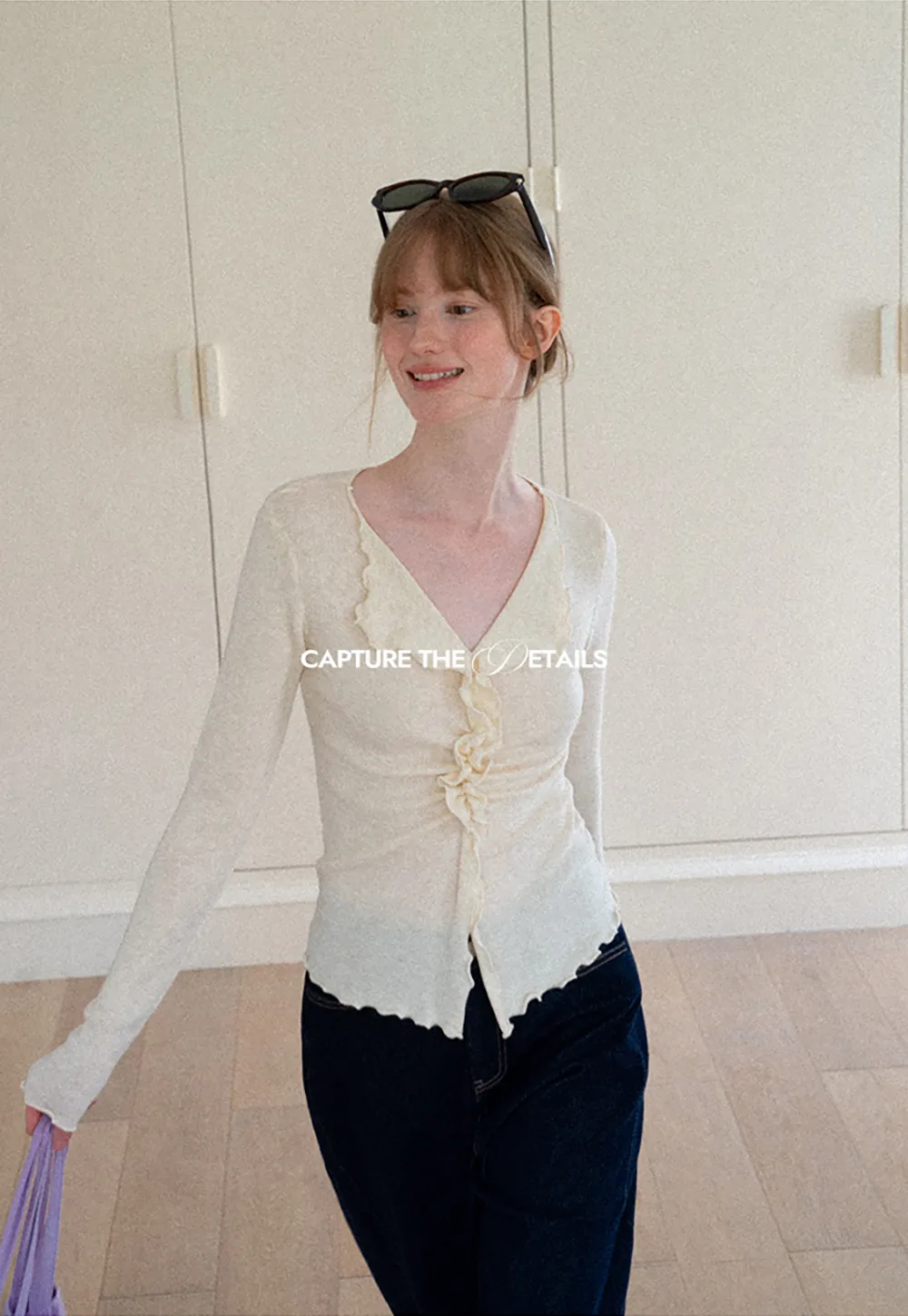 Ruffled V Neck Knit Sweater with Front Twist Detail
