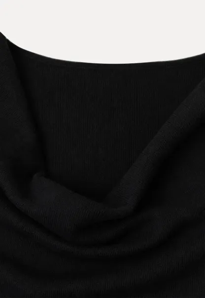 Asymmetrical Wrap Knit Sweater and Flowing Skirt