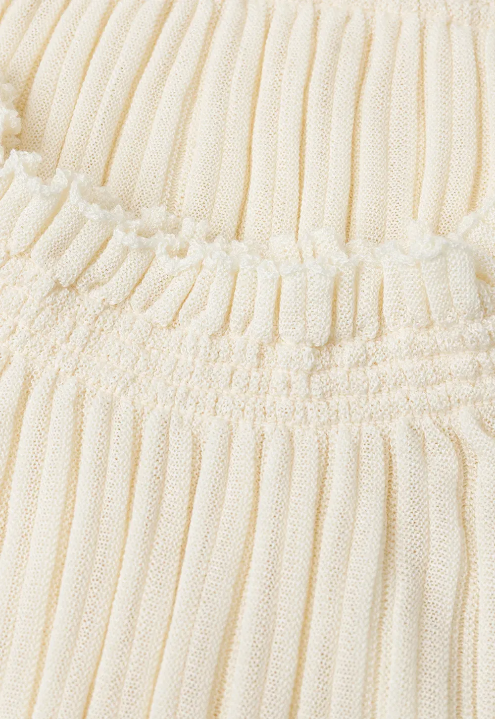 Ribbed Knit Sweater with Ruffled Hem and Flared Sleeves