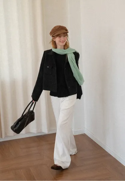 Ribbed Knit Sweater with Ruffled Hem and Flared Sleeves