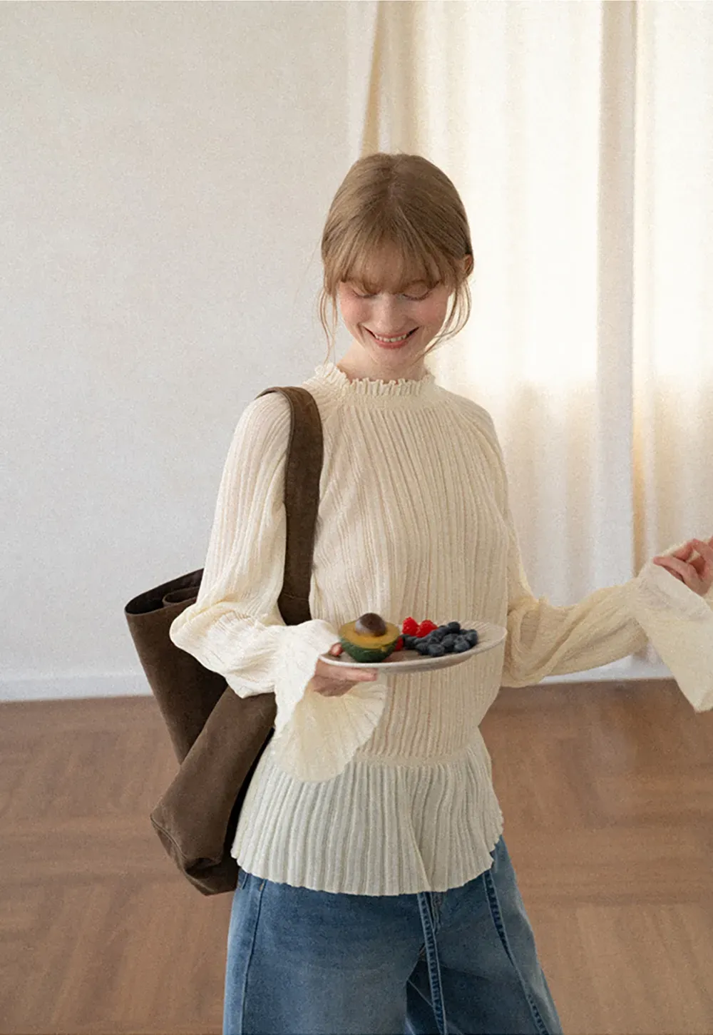 Ribbed Knit Sweater with Ruffled Hem and Flared Sleeves