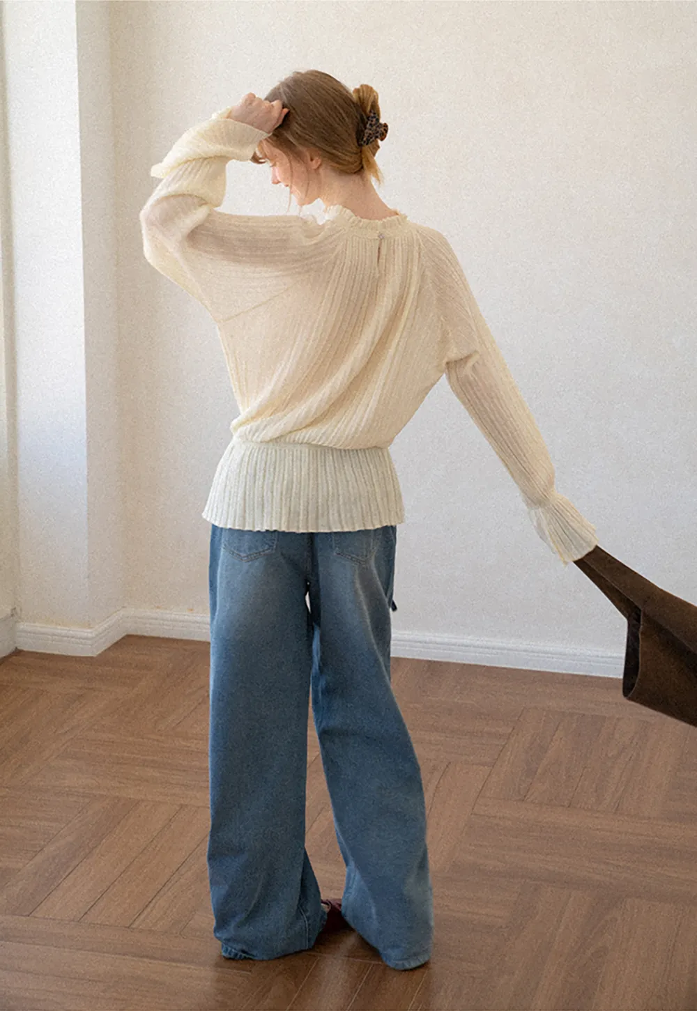 Ribbed Knit Sweater with Ruffled Hem and Flared Sleeves