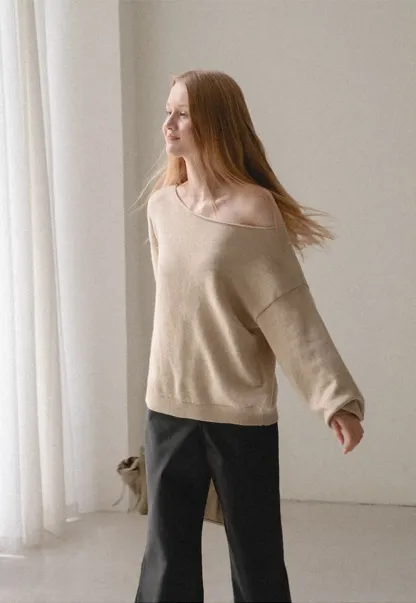 Off Shoulder Asymmetrical Knit Sweater