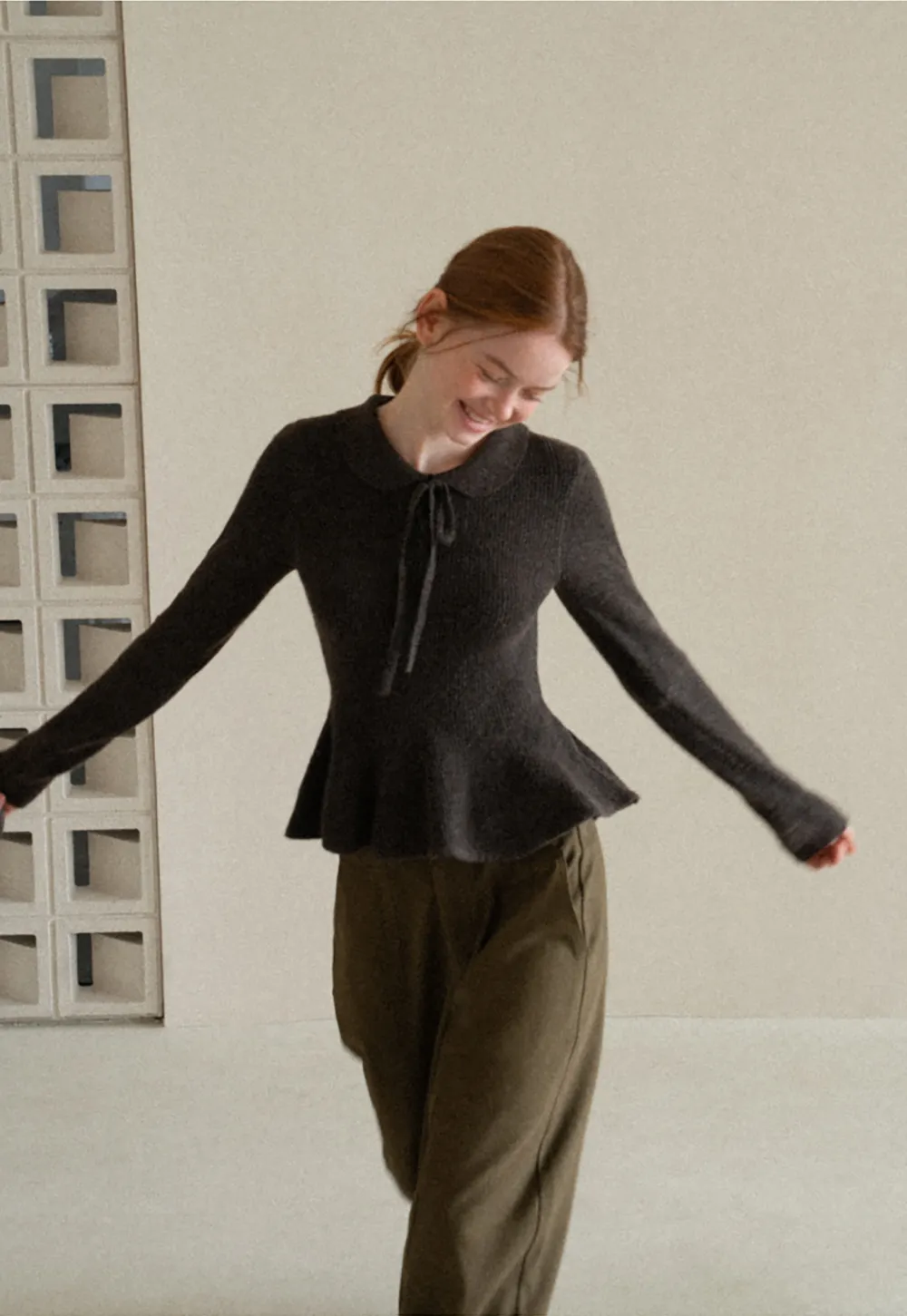 Ribbed Knit Flared Hem Sweater