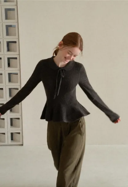 Ribbed Knit Flared Hem Sweater