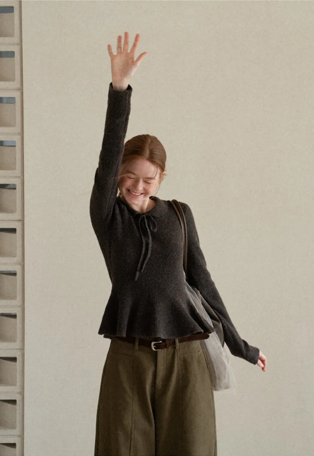 Ribbed Knit Flared Hem Sweater