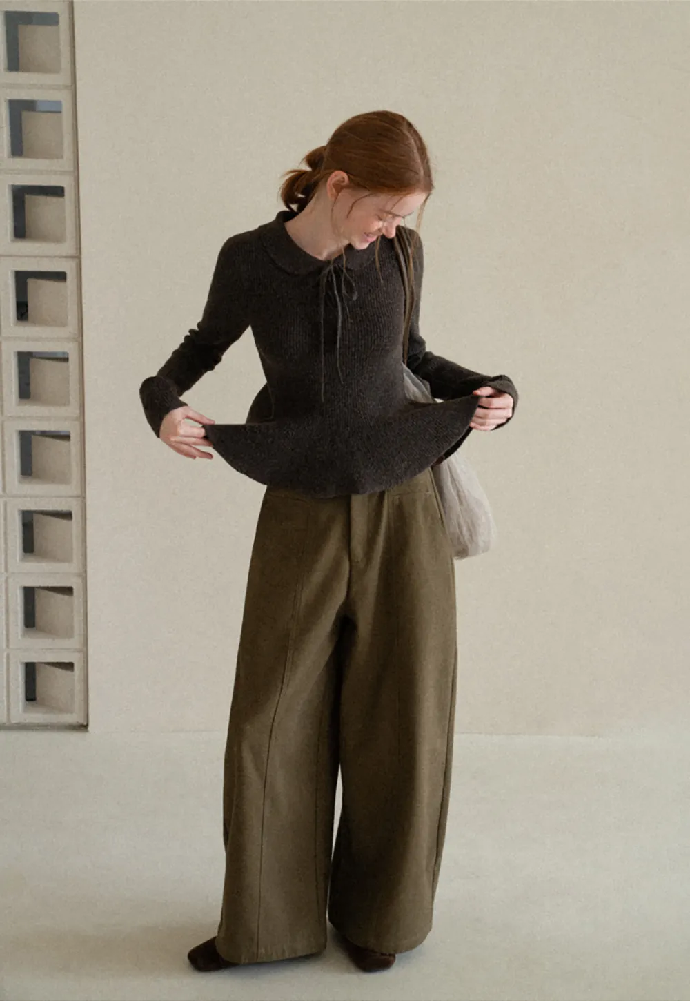 Ribbed Knit Flared Hem Sweater