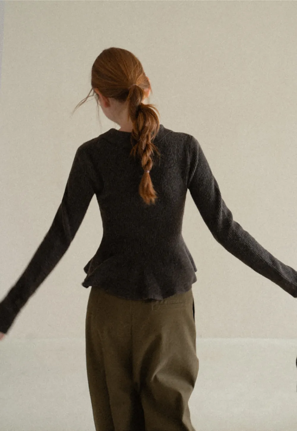 Ribbed Knit Flared Hem Sweater