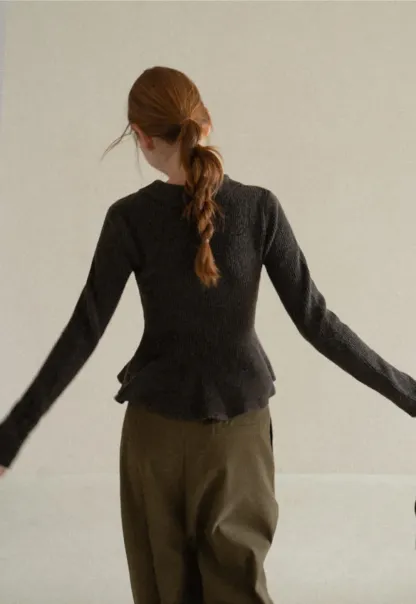 Ribbed Knit Flared Hem Sweater