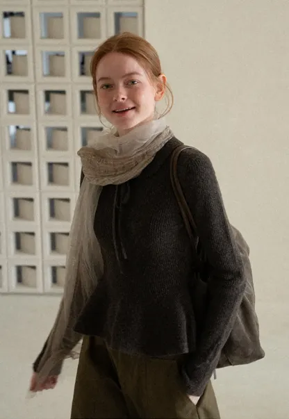 Ribbed Knit Flared Hem Sweater