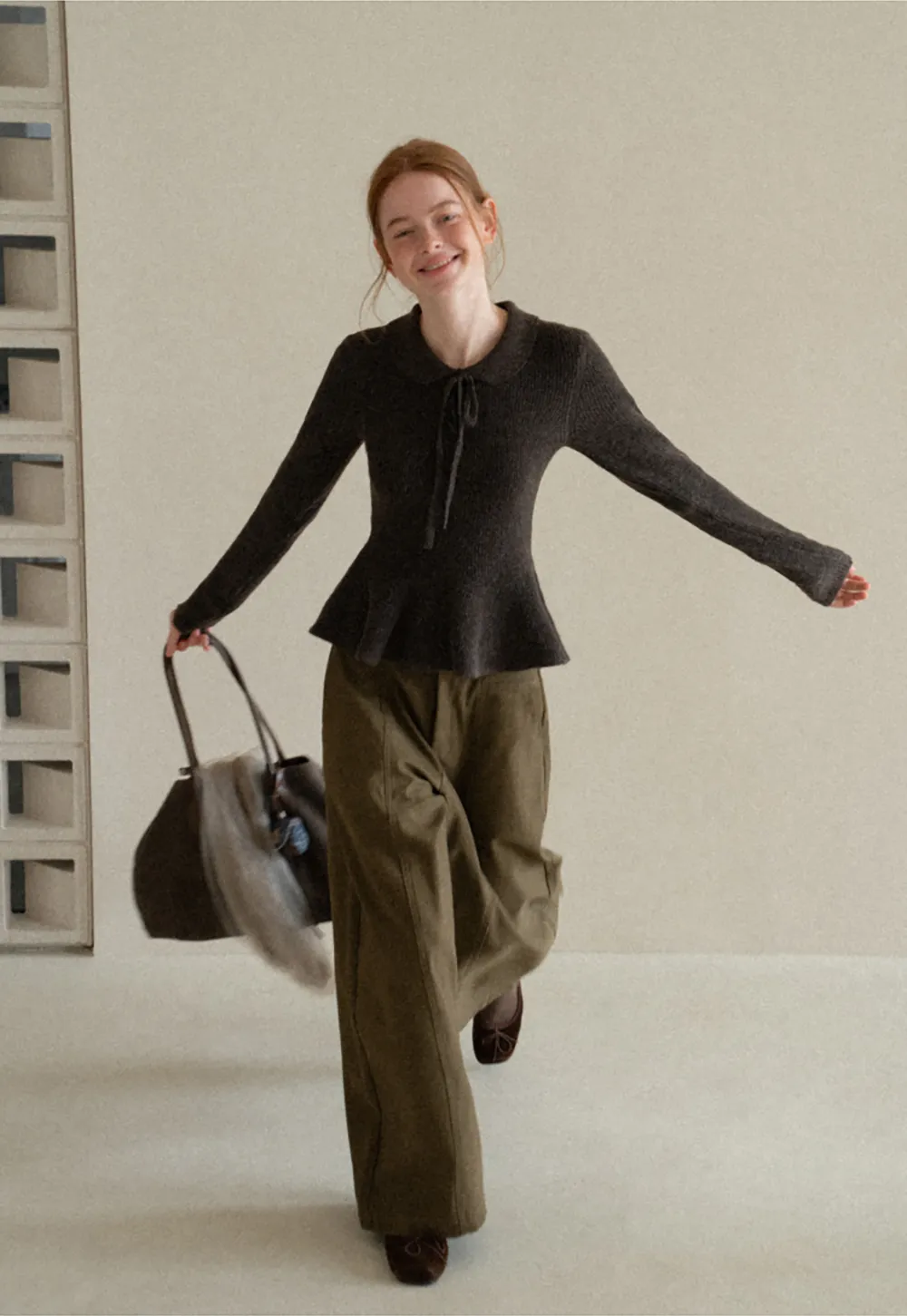 Ribbed Knit Flared Hem Sweater