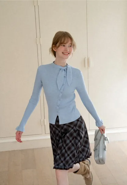 Ribbed Knit Cardigan with Bow Tie Neck and Ruffled Placket