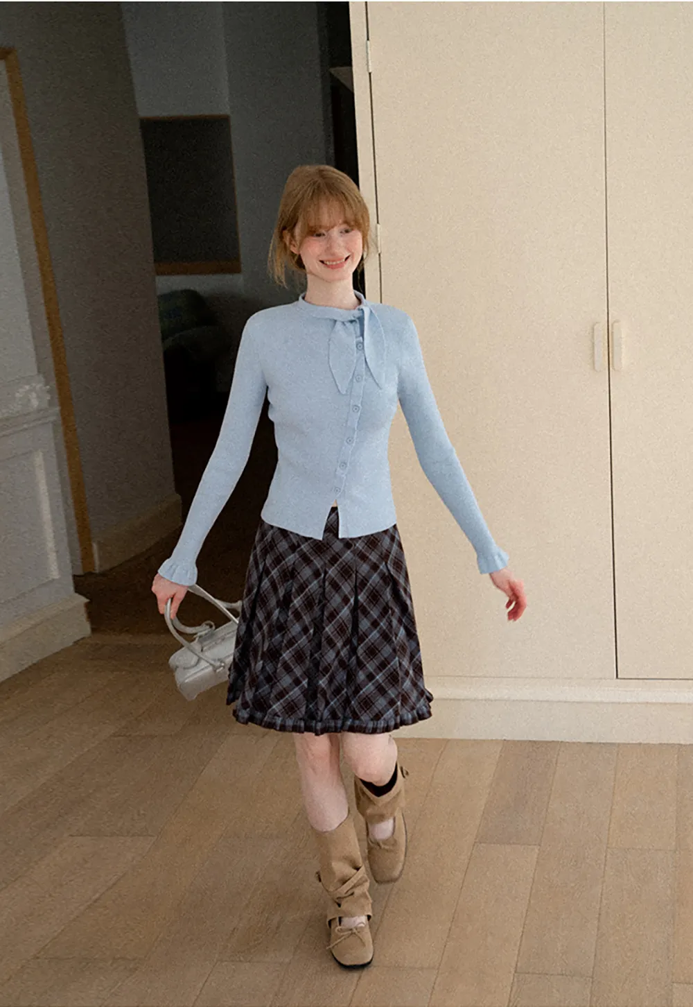 Ribbed Knit Cardigan with Bow Tie Neck and Ruffled Placket
