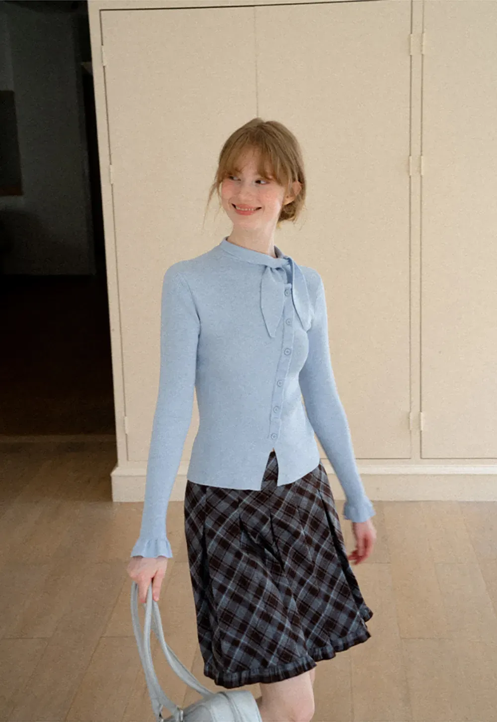 Ribbed Knit Cardigan with Bow Tie Neck and Ruffled Placket
