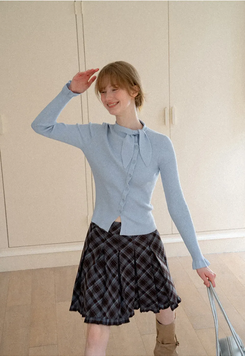 Ribbed Knit Cardigan with Bow Tie Neck and Ruffled Placket