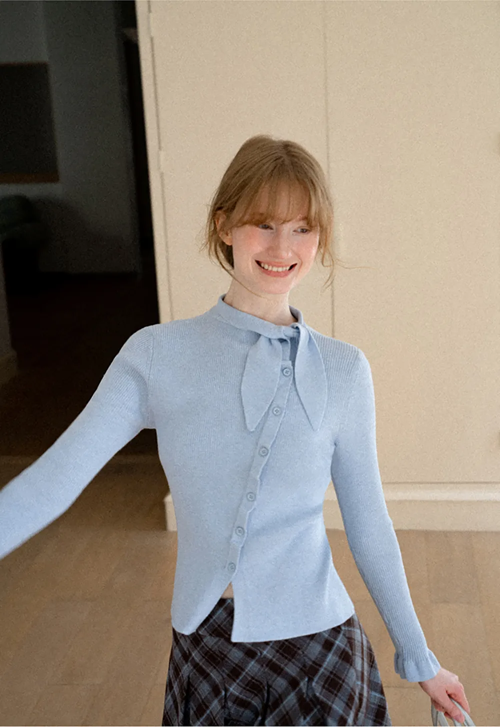 Ribbed Knit Cardigan with Bow Tie Neck and Ruffled Placket